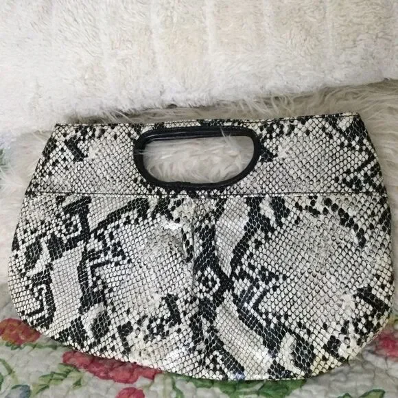 Carlos Falci clutch python look, vegan