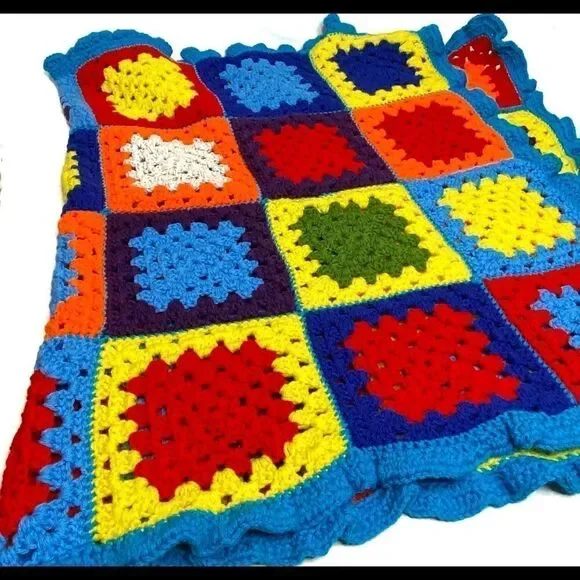 Hand crocheted bright multi colored Afghan size 56” X 31”