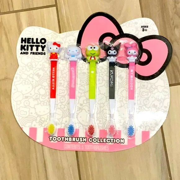 NIB Hello Kitty 5 character Toothbrush Set