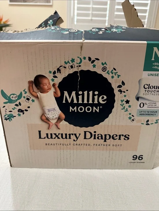 Opened box 69 LEFT out of 96 Millie Moon Luxury Diapers - NEWBORN