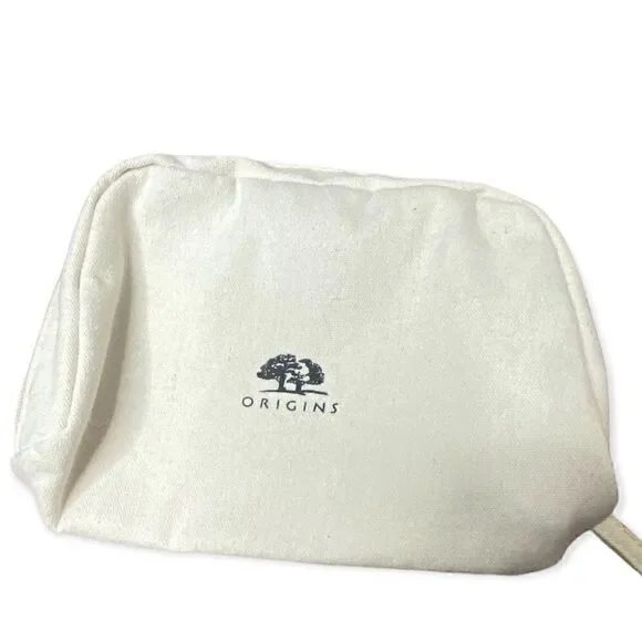 Origins cream canvas make up bag with zip closure small marks inside