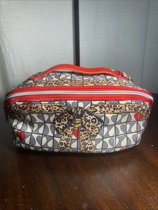 Brighton Wild Love cosmetic bag with bold leopard print and playful bow NWOT