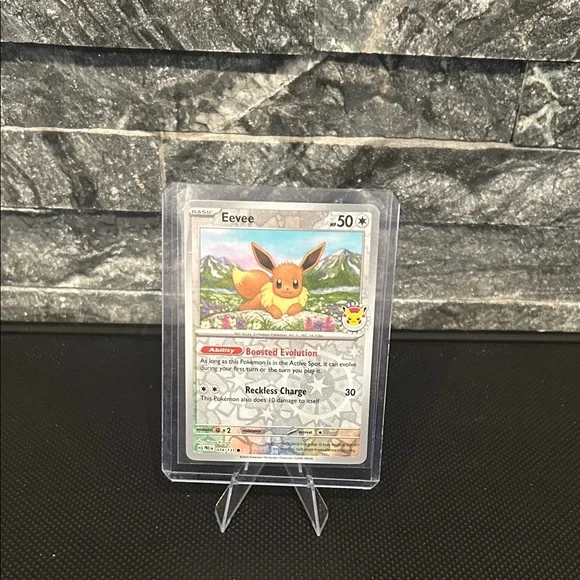 Pokemon Eevee 074/131 “Pokemon Day” Stamped Reverse Cosmos Holo M/NM‎ (2025)
