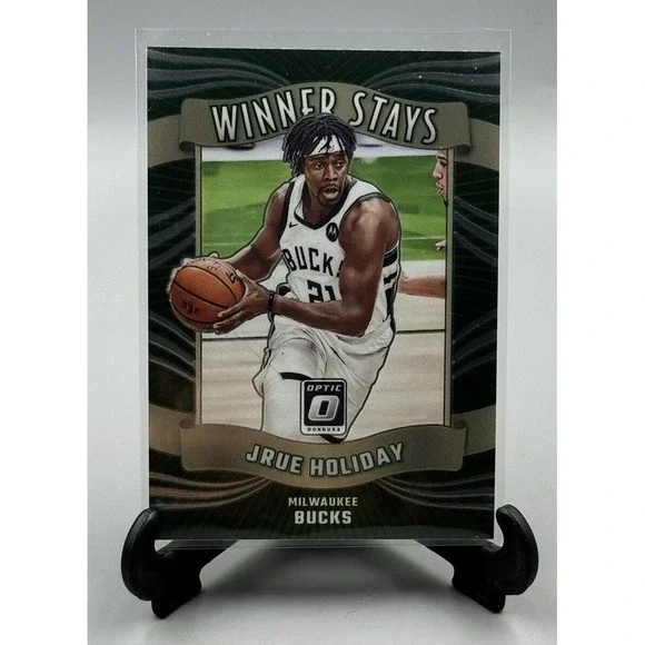 2023-24 Panini Optic #9 Jrue‎ Holiday Winner Stays Bucks