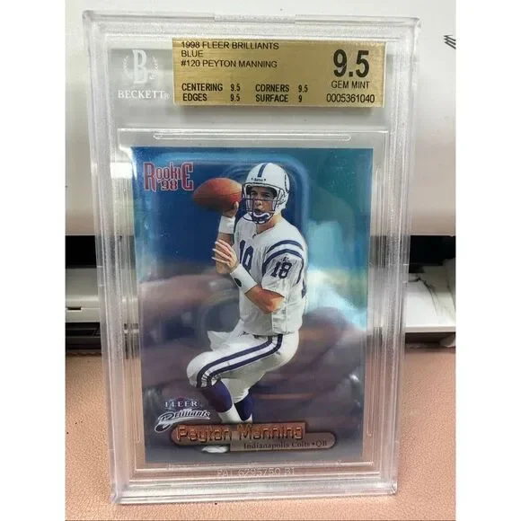 1998 Peyton Manning Fleer Brilliant Blue Rookie card. Beckett 9.5