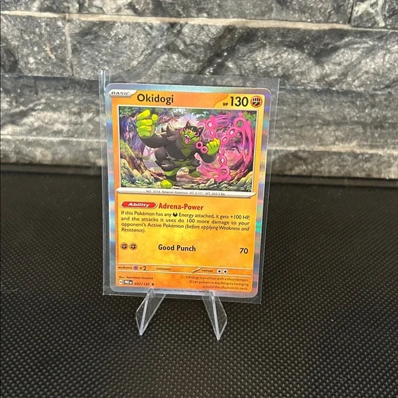 Pokemon Okidogi‎ 057/131 Holo Card from Prismatic Evolutions Set M/NM