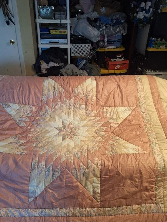 handmade queen size quilt in pink and white with 2 pillow shams and 2 small pill