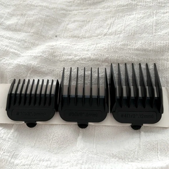 Brand new extra clipper combs, various sizes, see photos
