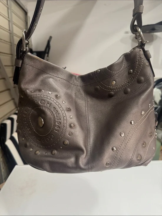 Coach Y2K Madison hobo bag featuring metallic pewter leather and silver studded