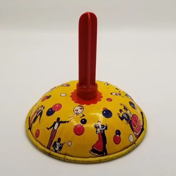 Vintage US Metal Toy Company tin art litho noisemaker bell style New Years theme