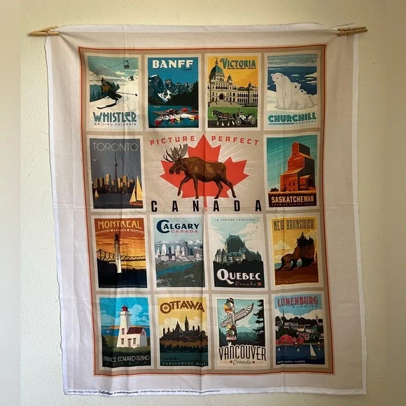 Canada Provinces and landmarks quilting material.  37” x 44” approx.