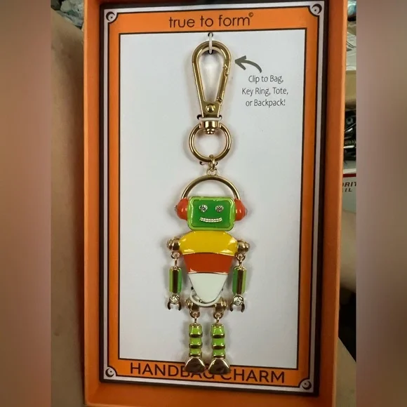 Handbag charm. Robot Candy Corn. The Robots arms & legs move. True To Form