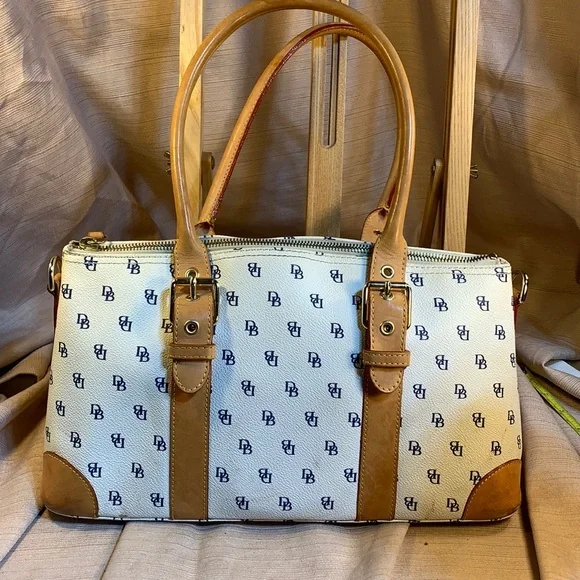 Dooney & Bourke leather satchel w/logo pattern
