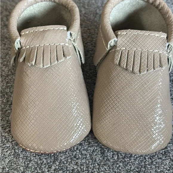 Freshly Picked Tan Moccasins with Fringe Detailing