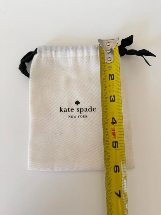 kate spade White Drawstring Logo Pouch with Black Ribbon