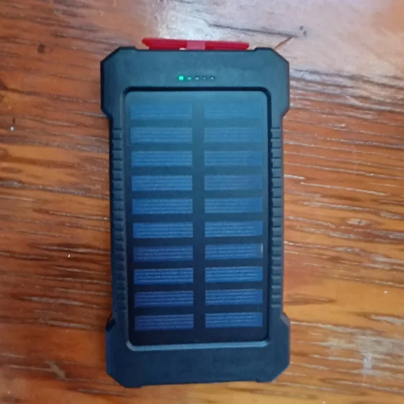 Solar powered phone charger w/ dual USB ports