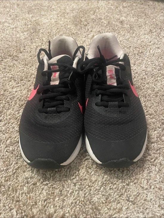 Nike Black Sneakers with Pink Swoosh Accents