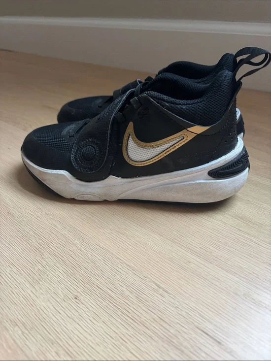 Nike Kids Black and Gold Basketball shoes
