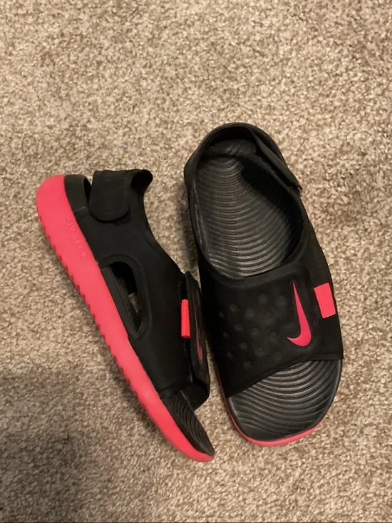 Nike Kids Black Slides with Bright Pink Accents