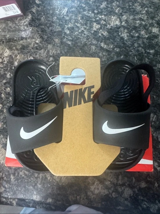 Nike Black Slide Sandals with White Swoosh Accent