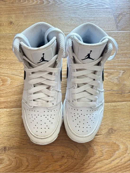Nike White High-Top Jordan Sneakers with Black Jumpman