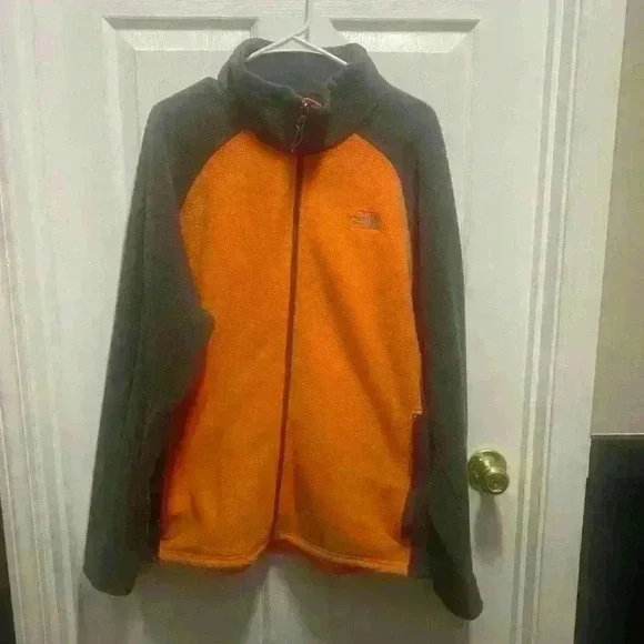 The North Face - orange and gray fleece jacket