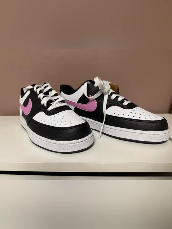 Nike  Black & White Sneakers with Pink Swoosh Accent