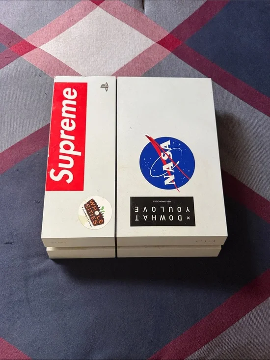 White Sony PlayStation 4 Console with NASA & Supreme Stickers