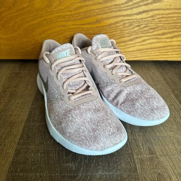 Nike Pink Sneakers with Sleek Design and White Accents