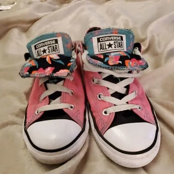 Cute bright pink Converse with floral tongue detail