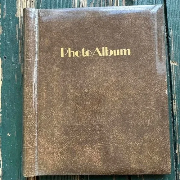 Brown dry-mount photo album with instructions for mounting photos