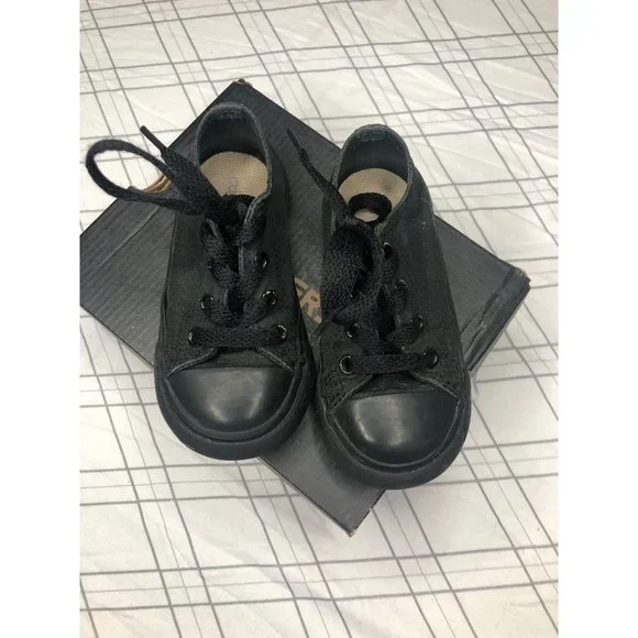Converse black low top