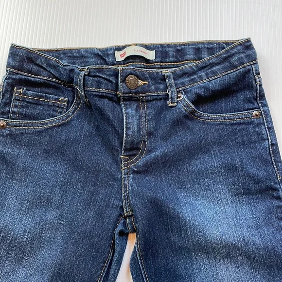 Levi’s 711 dark wash skinny jean.  Girls size 12
