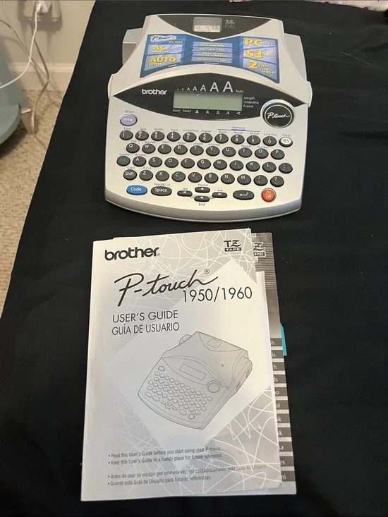 Brother P-touch Label Maker in White and Black with Blue Accents