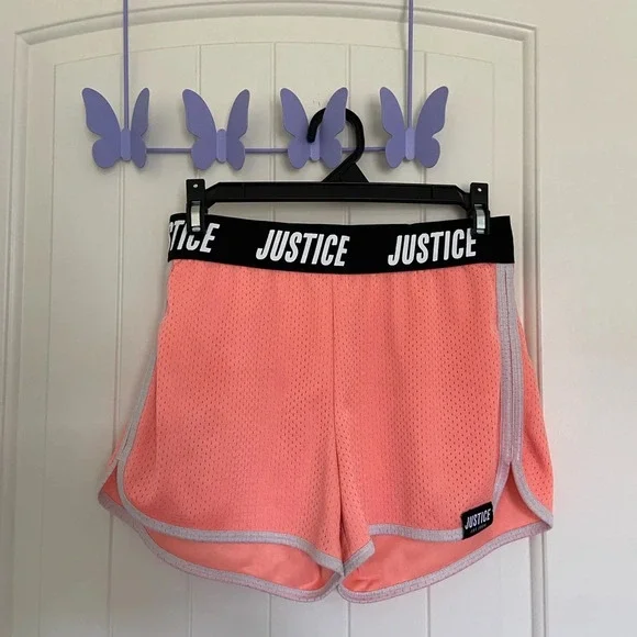 Justice girl’s peach athletic shorts —‎ XL
