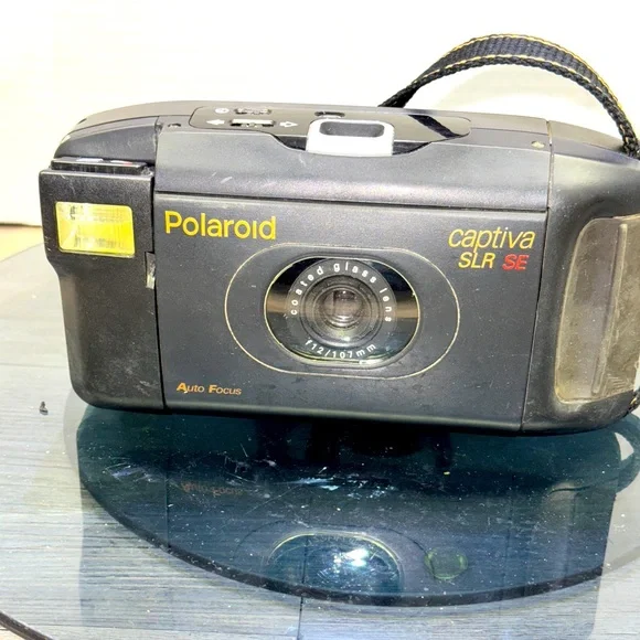 Vintage Polaroid Captiva SLR SE Instant 95 Film Camera Auto Focus Black