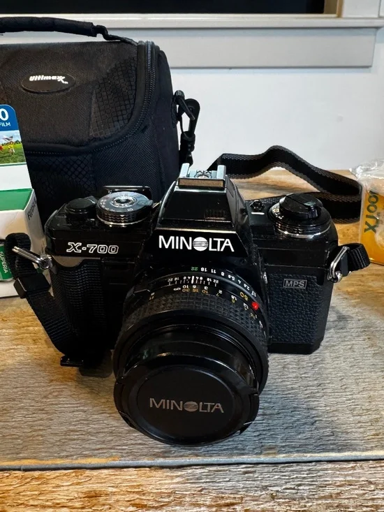 Minolta X-700 camera with case and extra film