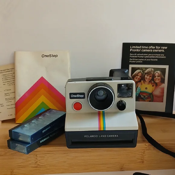Vintage Polaroid Land One Step Instant Film Camera with Iconic Rainbow Design