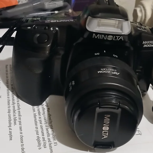 Black MINOLTA 300SI W/NOVA 1 LOWEPRO Case...MUST GO!!! ALL OFFERS WELCOME!!!