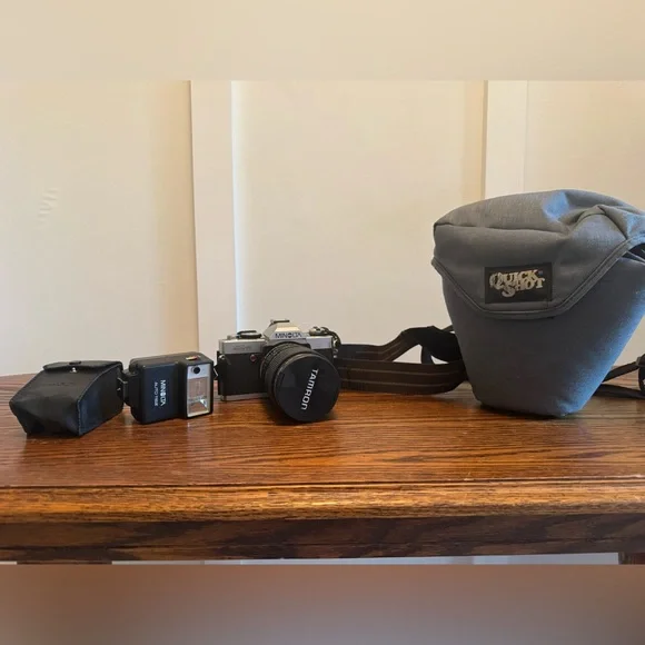 Minolta XG-A 35mm Film Camera with Black Tamron Lens Cap and photo flash Unit