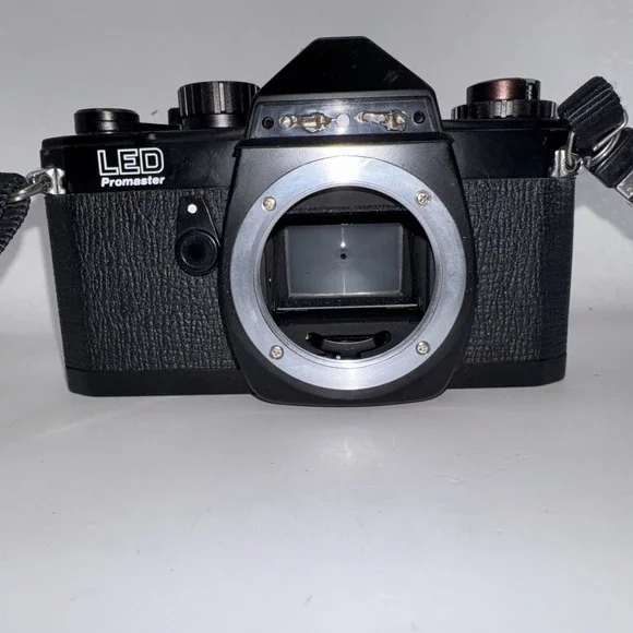 Chinon LED Promaster 35mm SLR Film Camera with Two Lenses and A Flash Untested