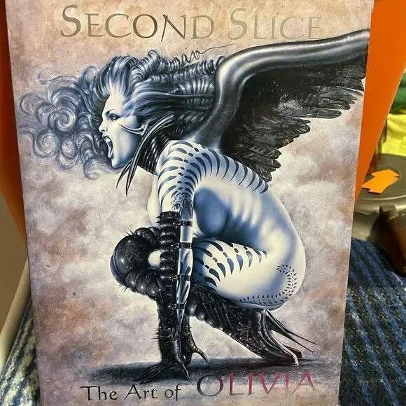 Second Slice The Art of Olivia Hardback Book