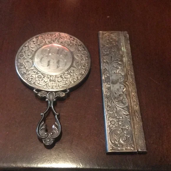 Antique silver small mirror and comb set