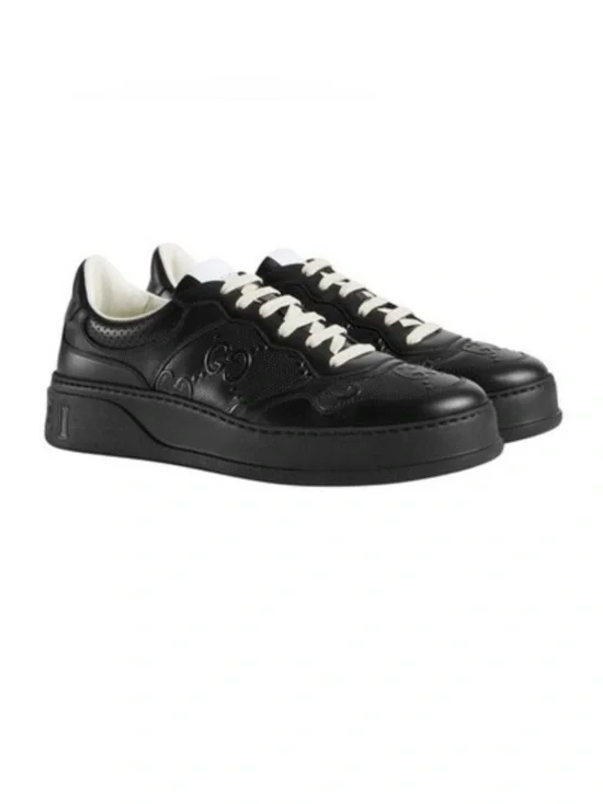 Gucci, GG embossed, black leather sneakers size 11 fits 11.5 made in Italy