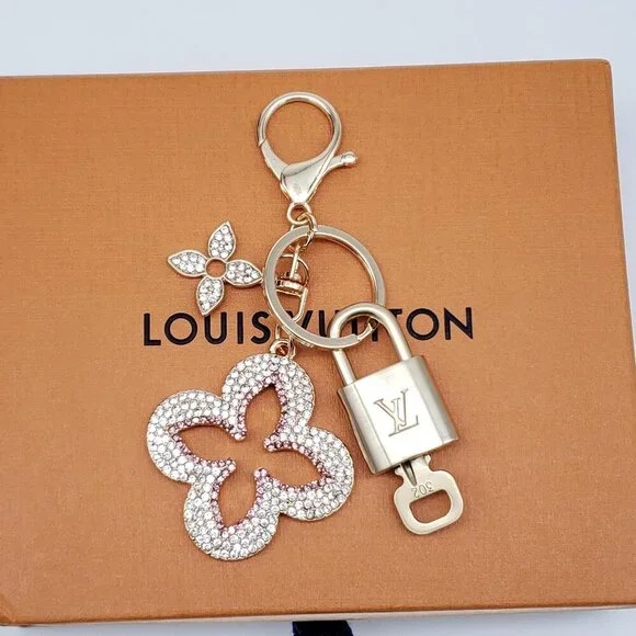 Authentic Louis Vuitton Gold Lock & Box w/ Unbranded Clover Bagcharm