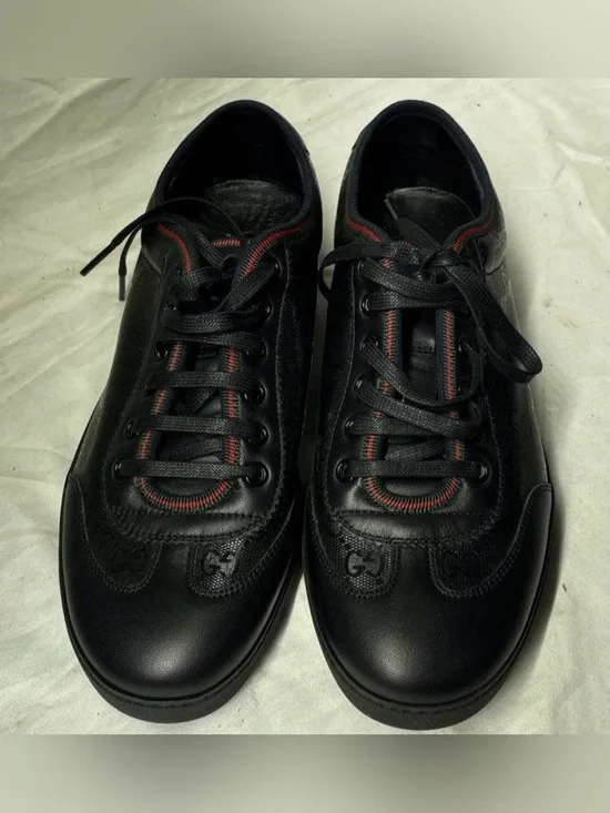 Gucci Black Leather Sneakers with Red Stripe Accents