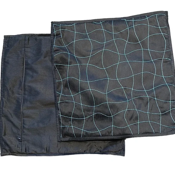 Two 18 x 18 brown with blue design pillow covers