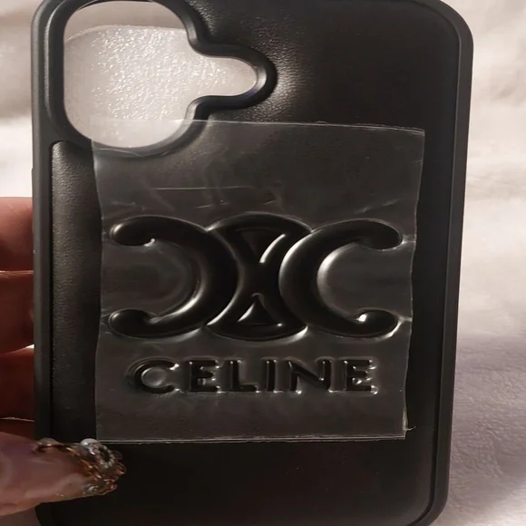 Celine Black Triomphe Phone Case. I don't know what phone this fit , not mine!