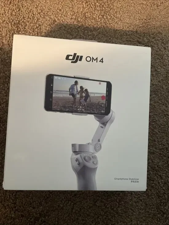 DJI OM4 3-Axis Gimbal Stabilizer / Tripod for Smartphones New