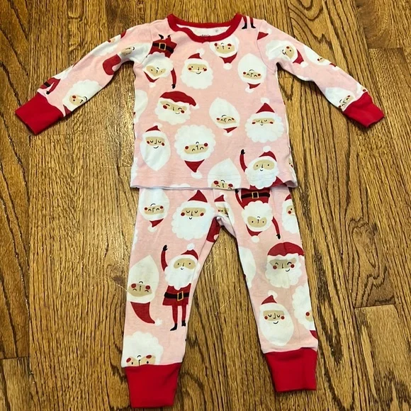 LIKE NEW PINK SANTA PATTERN PAJAMAS - CARTERS 9M